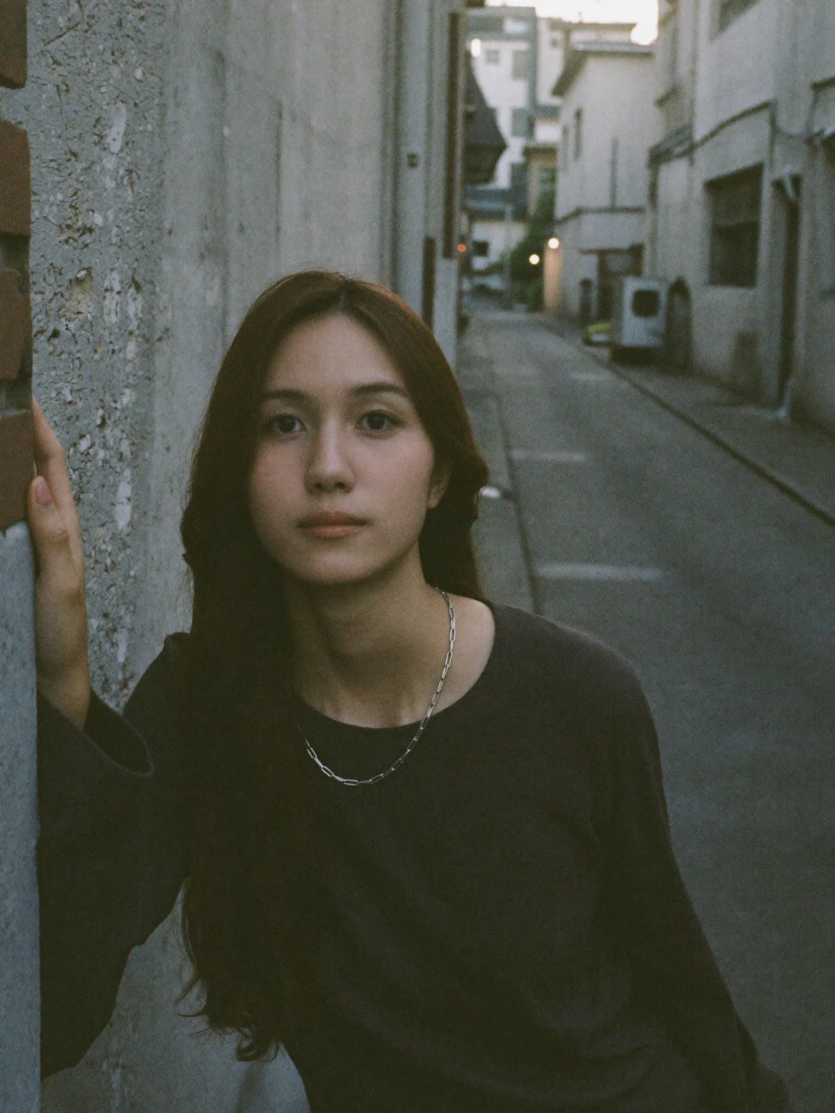 Quiet dusk alley, a paperclip silver chain