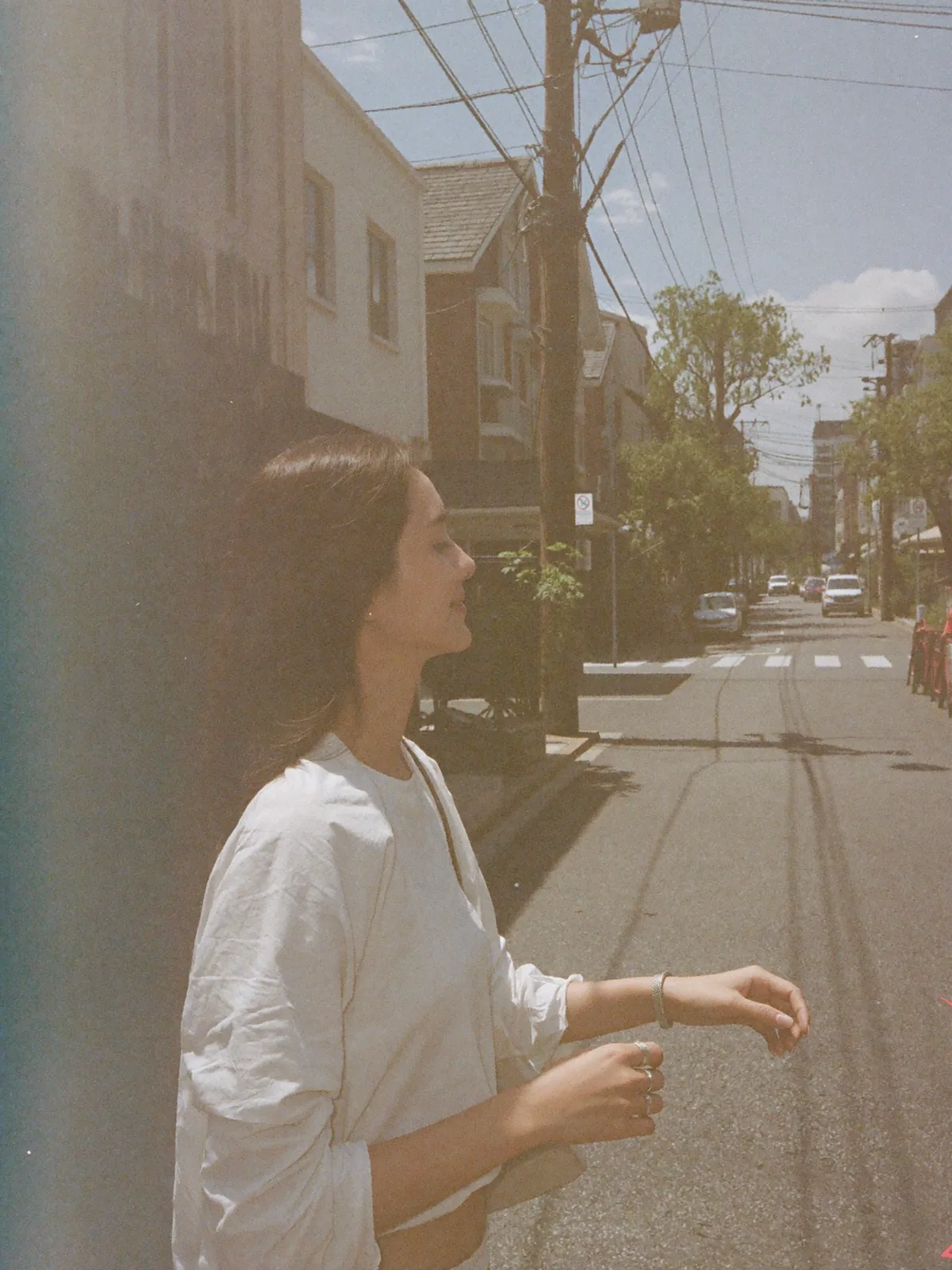 Sunny street walk, a silver bracelet and rings
